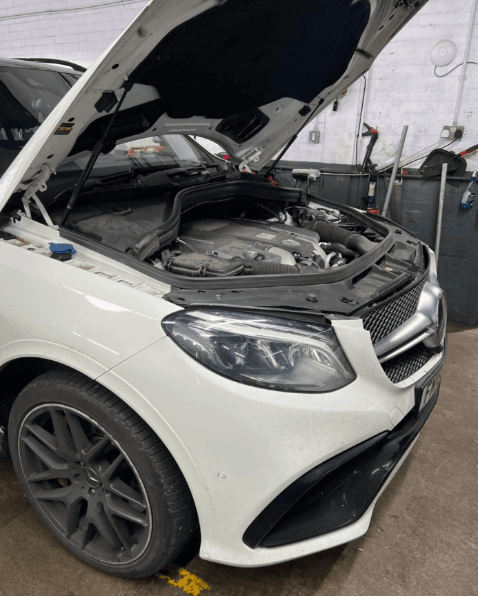 Mechanic working on a car